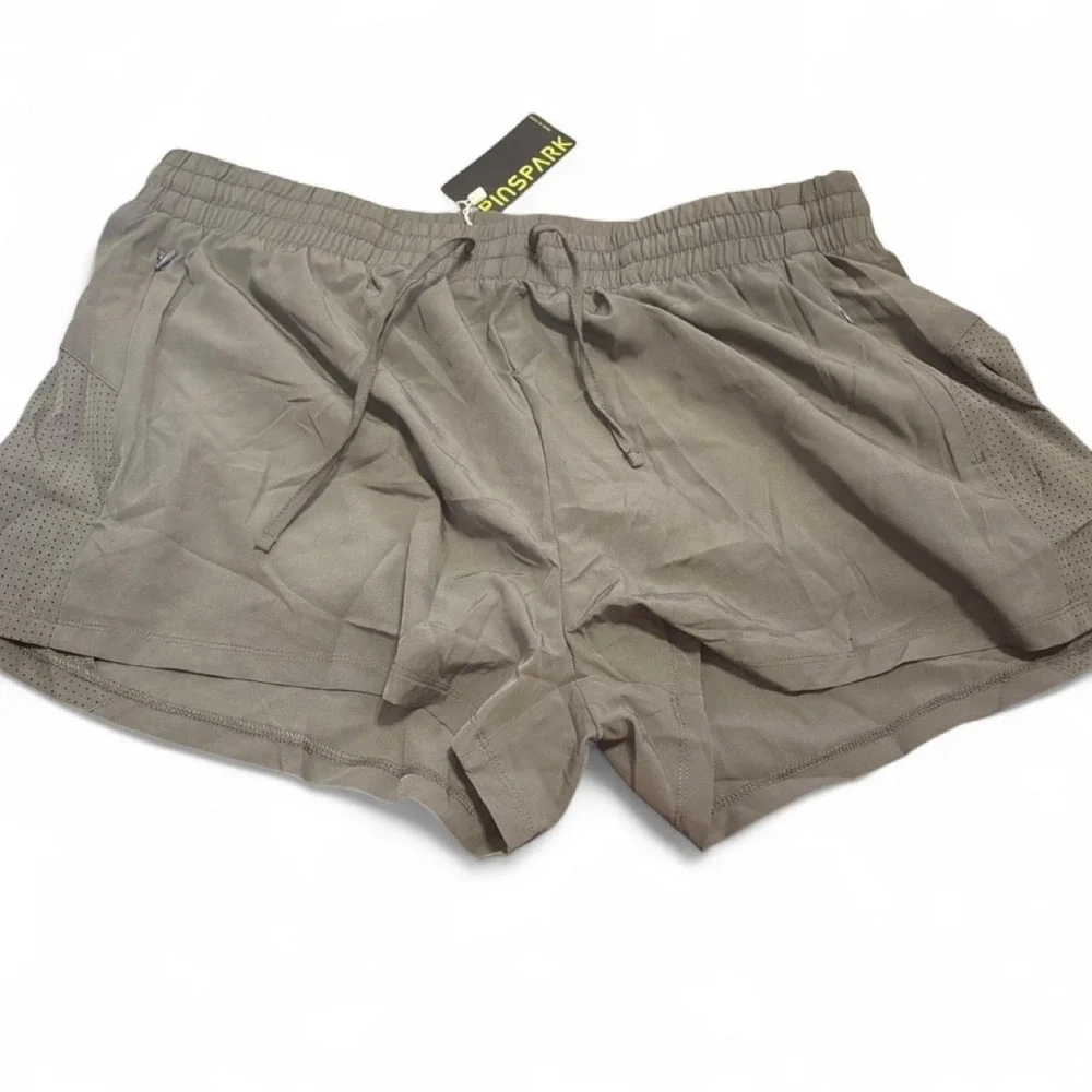 Pinspark athletic running shorts in a versatile khaki/olive color Size XXL